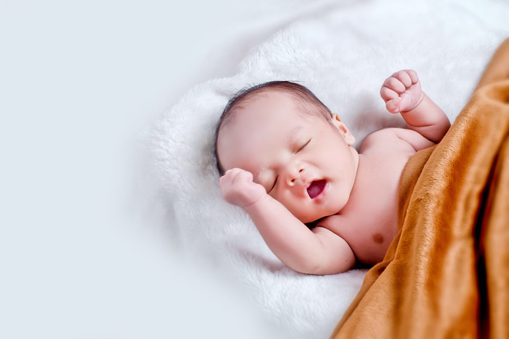 Hoeveel uur mag een baby achter elkaar slapen? Slaapritme baby